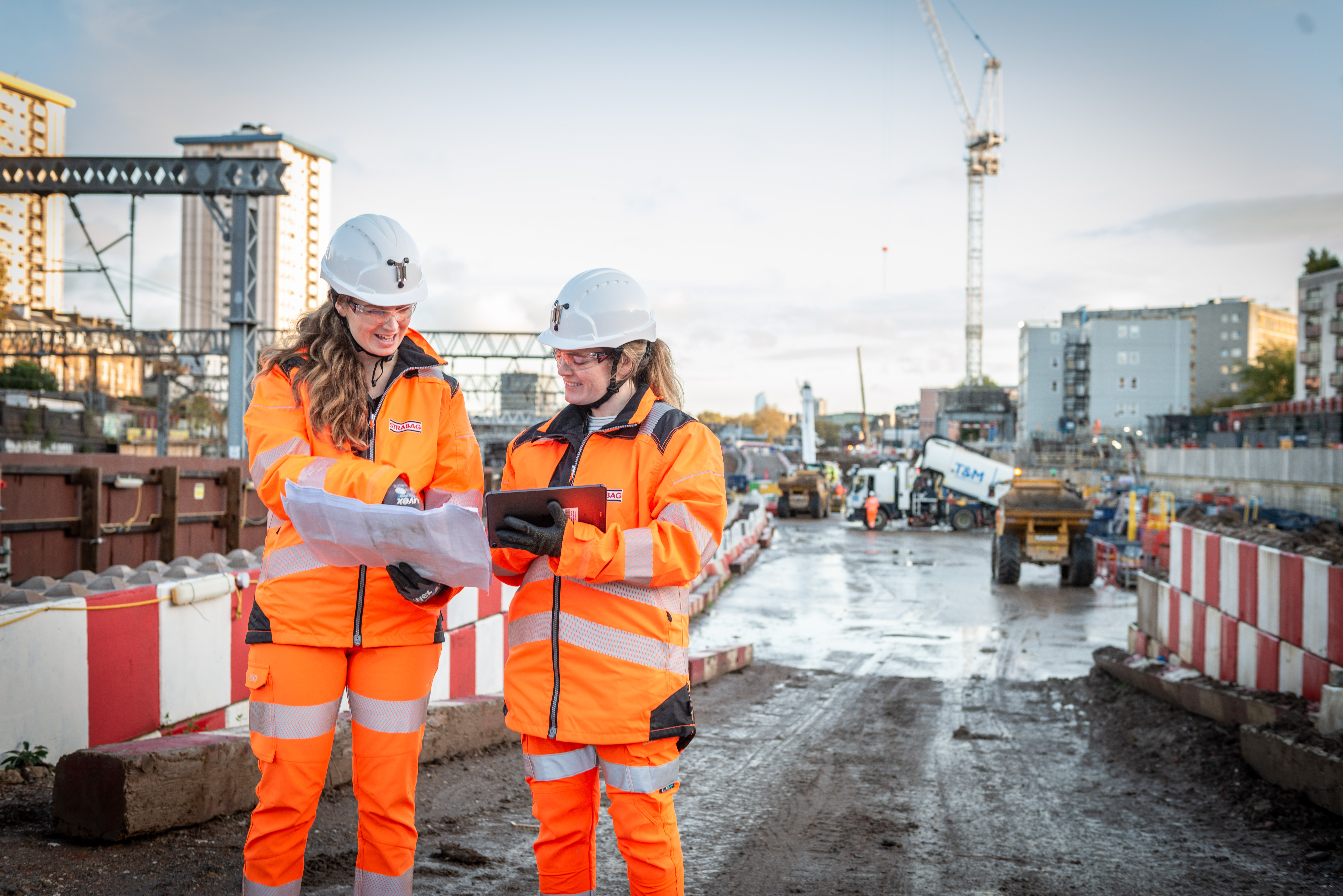 Photo of two employees at work