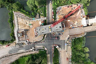 Construction site surounded by water and nature