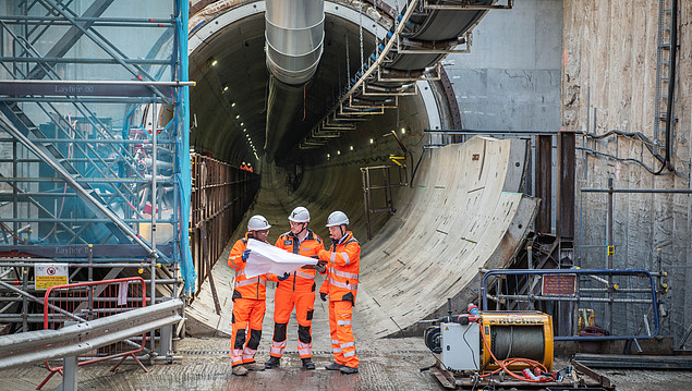 Photo of three construction workers during the sewer inspection